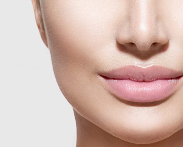 close up of woman's lips aftr having beauty services