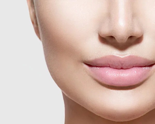 close up of woman's lips aftr having beauty services