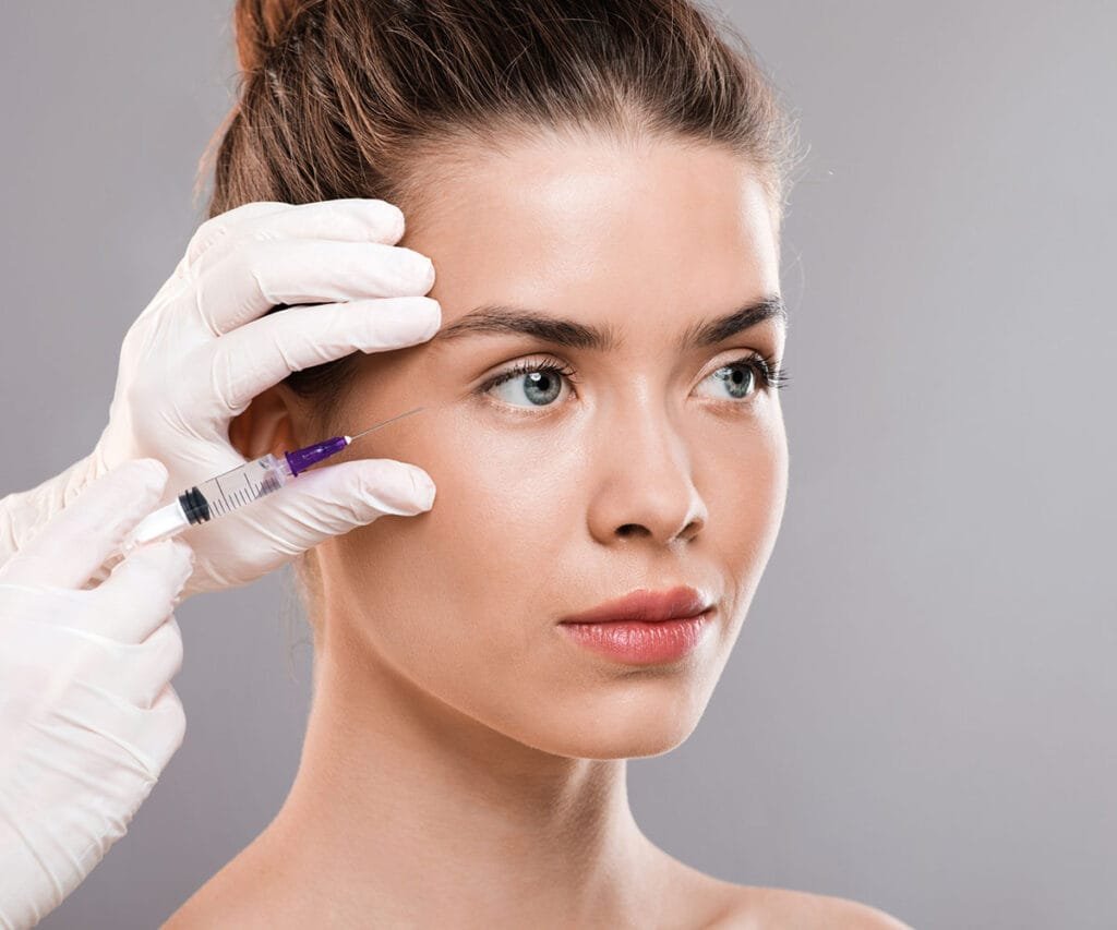 Beautiful woman receiveing beauty injections