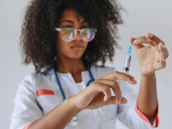 Belle Ange Health Service female nurse preparing beauty injections