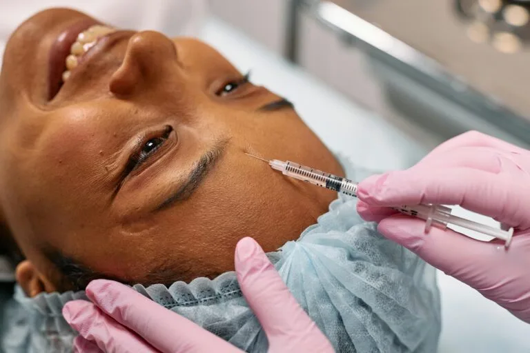 Belle Ange Health Service woman smiling and having derma fillers botox