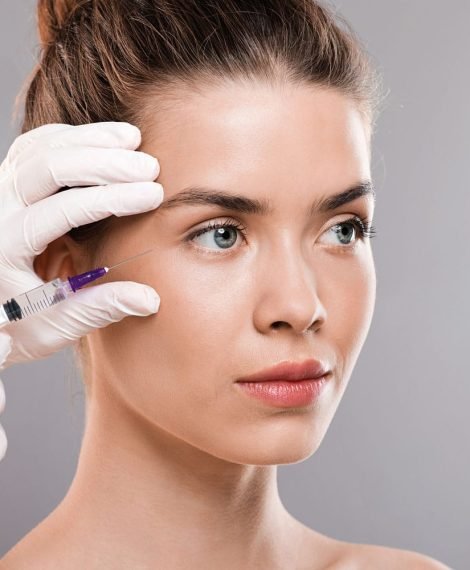 Beautiful woman receiveing beauty injections